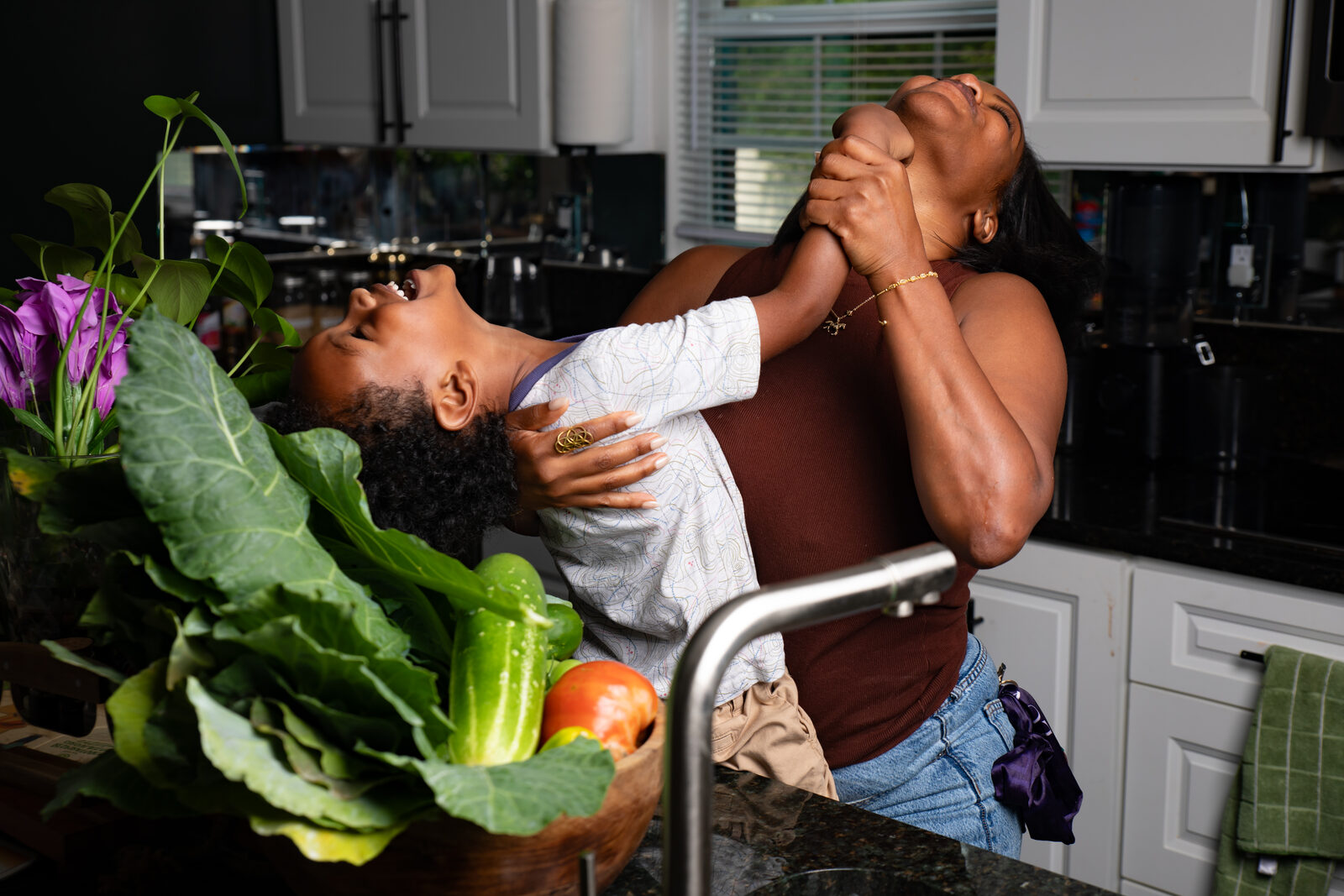 A joyful embrace in the kitchen